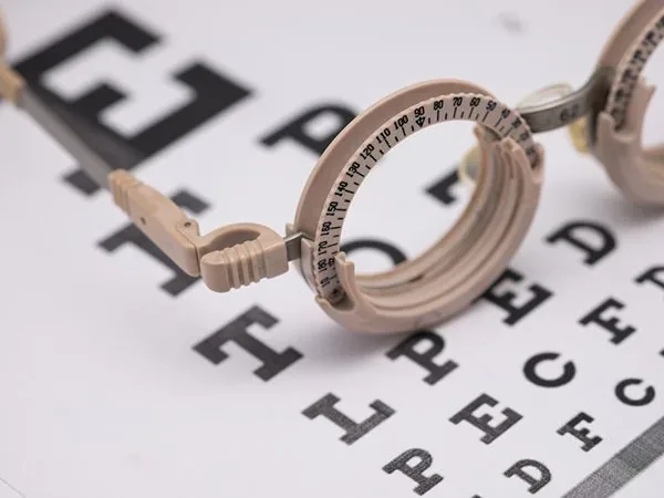 Trial frame over an eye chart